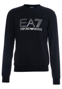 Černá mikina, bavlněný materiál, kulatý výstřih, dlouhé rukávy, žebrované manžety a lem. Na přední straně se nachází bílé logo EA7 Emporio Armani.