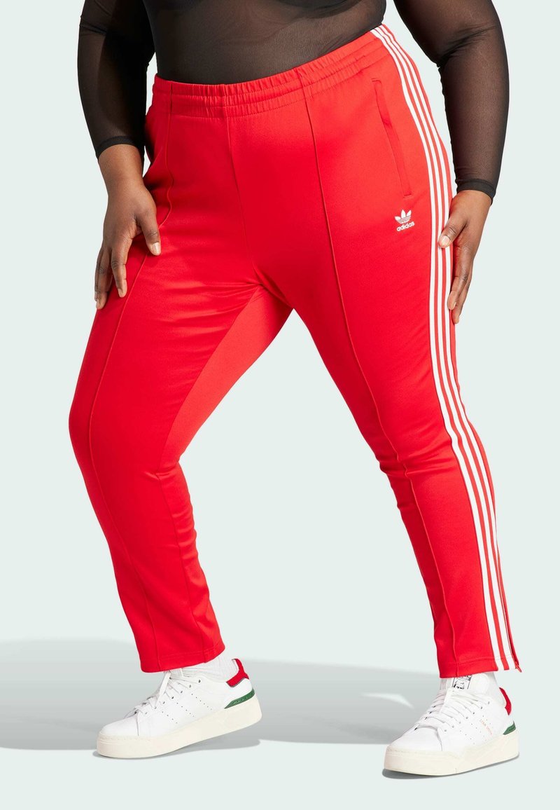 adidas Originals - ADICOLOR SUPERSTAR PLUS SIZE - Tracksuit bottoms - better scarlet, Enlarge