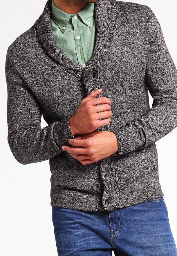 Gray knit cardigan with a shawl collar, button-front closure, and ribbed cuffs. Worn over a light green collared shirt.