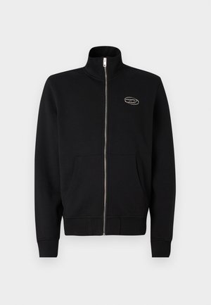 Sweatshirt zipé noir avec col haut, poches latérales et poignets ribérés. Présente un petit logo sur la poitrine, fabriqué en tissu doux.