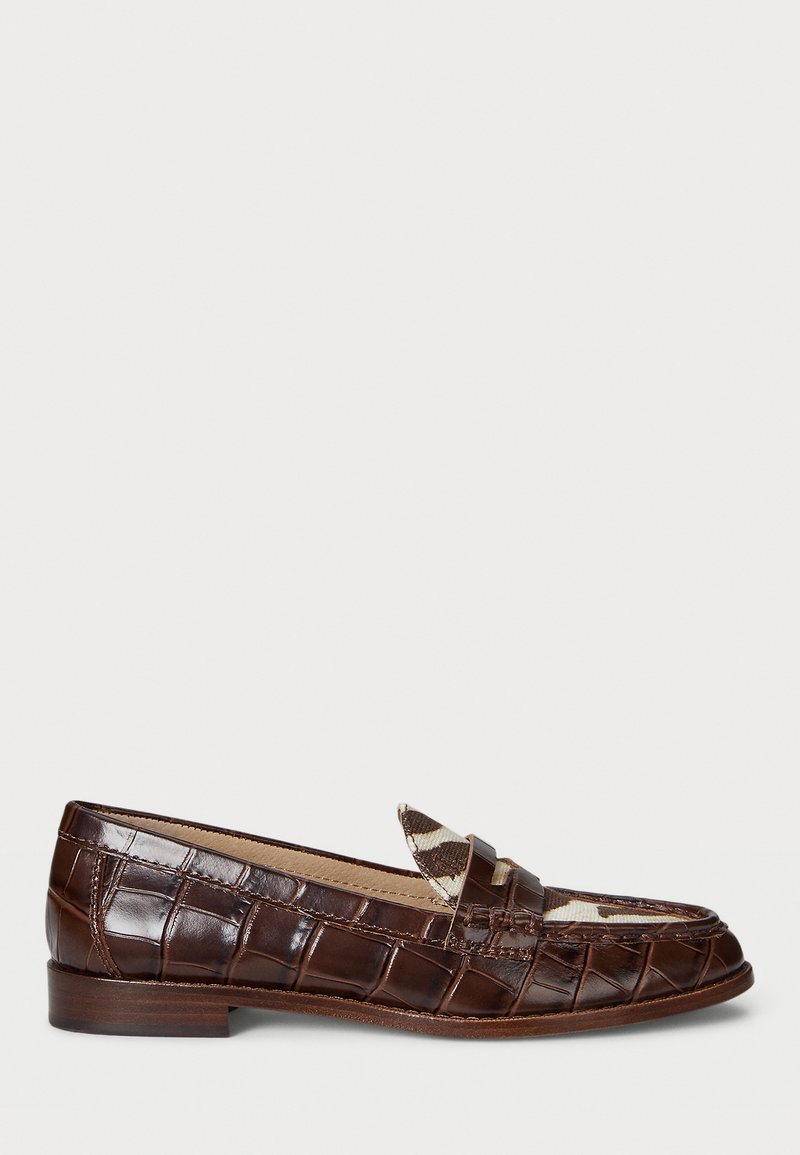 Brown leather loafers with a crocodile texture, featuring a contrasting patterned strap across the instep and a low stacked heel.