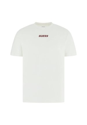 Tricou alb cu mâneci scurte, realizat din bumbac, cu un logo „GUESS” roșu centrat pe partea din față. Design clasic cu guler rotund.