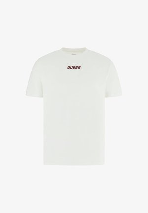 Biała koszulka z krótkim rękawem wykonana z bawełny, z czerwonym logo "GUESS" umieszczonym na środku przodu. Klasyczny fason z okrągłym dekoltem.