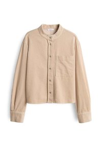 Beige corduroy overhemd met hoge kraag, knoopsluiting en één borstzak. Heeft een gestructureerde, ribbelige stof en lange mouwen.