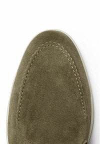 Olive green suede shoe with a rounded toe, featuring light stitching along the perimeter and a white rubber sole. Smooth texture.