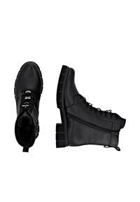 Remonte Bottines à plateau - schwarz