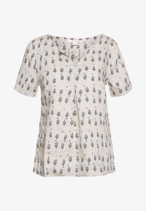 Beige Bluse mit kurzen Ärmeln, schwarzen Blattmustern und blauen Punkten, mit V-Ausschnitt und zentraler Vorderfalte.