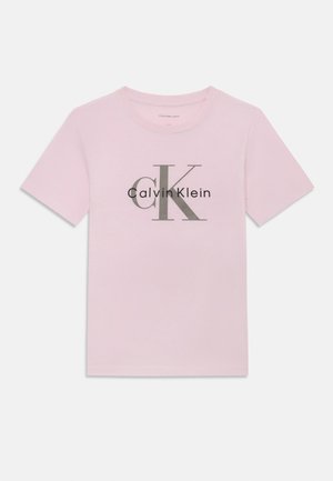 Pink cotton t-shirt with short sleeves, featuring a grey logo design with "Calvin Klein" and stylized "CK" on the front.