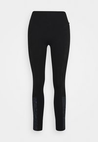 Leggings neri con pannelli testurizzati con un motivo in pelle di serpente sui lati, progettati per una forma aderente e comfort.