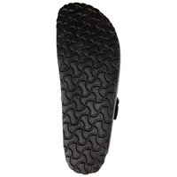 Schwarze Schuhsohle mit einem strukturierten Wellenmuster für besseren Halt. Verfügt über eine glatte Kante und einen Befestigungspunkt für einen seitlichen Riemen.