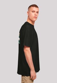 F4NT4STIC PINOCCHIO - Print T-shirt - schwarz