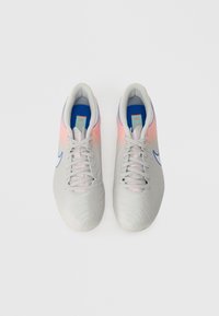Pair of light gray athletic shoes with blue and pink accents, white laces, and blue insoles, viewed from above on a white background.