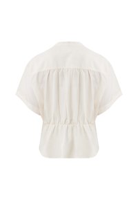 Blusa color crema con schiena arricciata, maniche corte e una texture morbida e liscia. Presenta un collo rotondo e una vita affusolata.