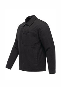 Svart long-sleeve jacka med vävd struktur, knappstängning framtill och en bröstficka. Har en rak krage och sidfickor.