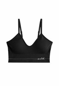 Must mustrõngaga V-kaelusega must bralette, reguleeritavad rihmad ja sile tekstuur. Omab elastse paela ääres valget logo.