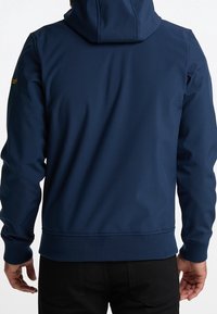 Marineblaues Kapuzenjacke mit glatter Textur, gerippten Bündchen und Saum. Mit einem Logo auf der linken Schulter.