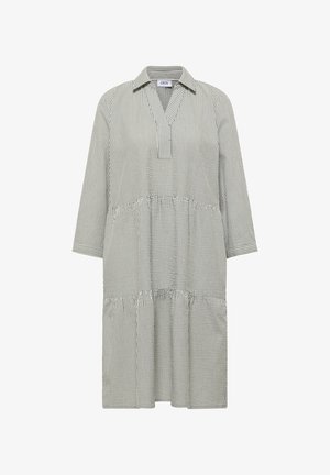 Sukienka z długim rękawem do kolan z pionowymi czarno-białymi paskami, kołnierzykiem, dekoltem w serek i warstwowymi, marszczonymi panelami spódnicy.