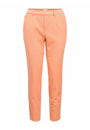 Kalhoty v broskvové barvě vyrobené z hladkého materiálu, s elastickým pasem, bočními kapsami a úzkým, přiléhavým střihem.