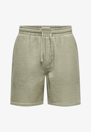 Hellgrüne, strukturierte Shorts mit Waffelmuster. Verfügt über einen elastischen Bund und eine Kordelzug für einen sicheren Sitz.
