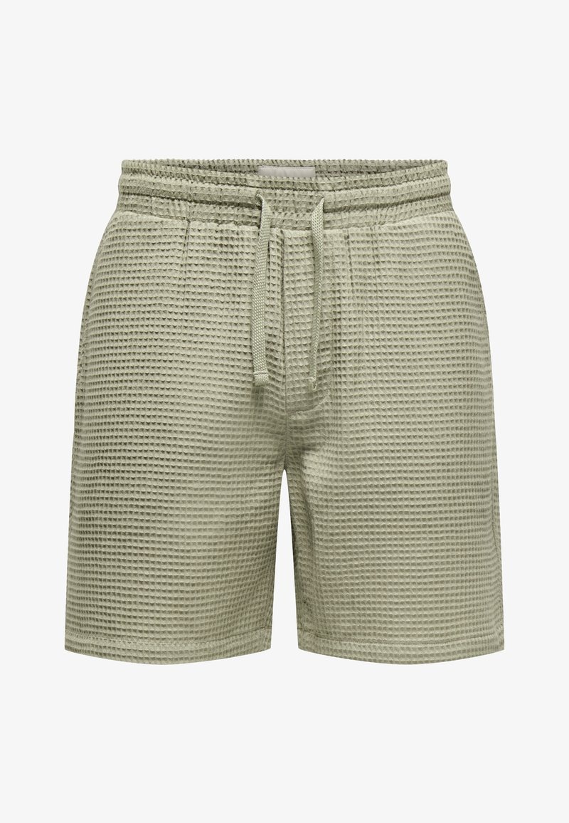 Pantalones cortos de color verde claro con textura y patrón de gofre. Cuentan con una cinturilla elástica y cordón para un ajuste seguro.