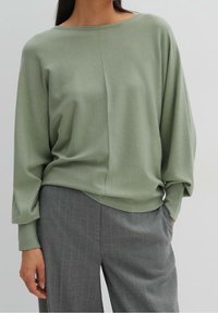 someday. Stickad tröja - green