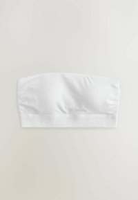 Witte straploze beha gemaakt van soepel materiaal. Heeft een zachte, gerimpelde bovenkant en een gewoven band met "NEXT" branding.