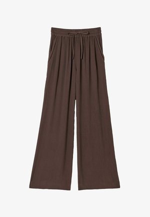 Barna, bő szárú nadrág rugalmas derékrésszel és húzózsinórral, oldalán zsebek dekoratív varrással.