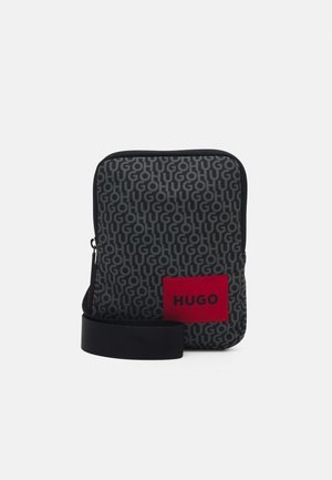 ETHON UNISEX - Across body bag - black