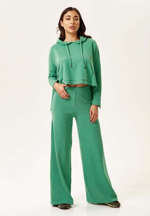 WIDE - Trousers - green