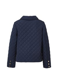 Giacca trapuntata blu navy con cuciture a diamante, maniche lunghe, colletto e dettagli in oro sui polsini.
