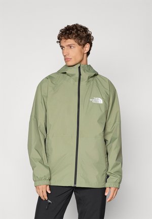 Wasserabweisende olivgrüne Jacke mit Reißverschluss, elastischen Bündchen und Logo-Akzent; verfügt über eine Kapuze und ein schlichtes, elegantes Design.