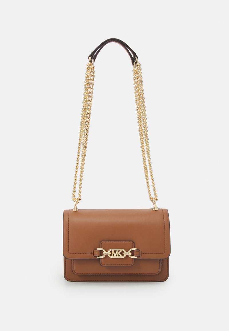 Brown leather handbag with a flap closure, gold chain strap, and decorative gold hardware featuring a logo clasp. Smooth texture and structured design.