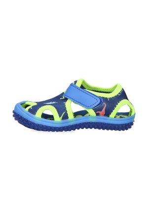 Sandalia azul y verde neón con diseño abierto, correa de Velcro y suela de goma texturizada. Presenta un patrón de hojas tropicales y aves.