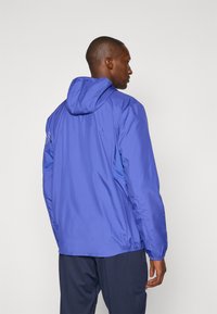 ASICS ICON JACKET - Veste coupe-vent - royal