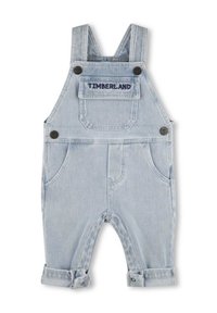 Salopette in denim azzurro chiaro con bretelle regolabili, ricamo del logo sulla tasca frontale e orli arrotolati, dotata di due tasche laterali.
