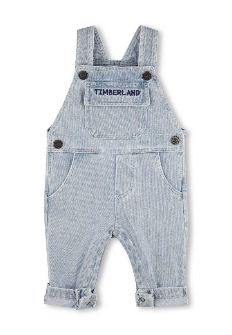 Salopette in denim azzurro chiaro con bretelle regolabili, ricamo del logo sulla tasca frontale e orli arrotolati, dotata di due tasche laterali.