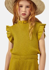MIPOUNET Shorts - ochre