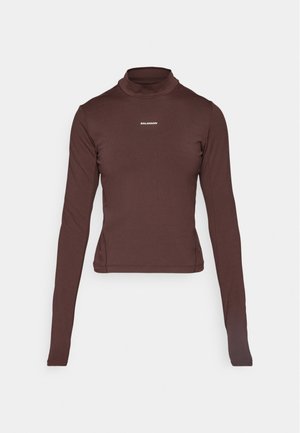 Brown long-sleeve fitted turtleneck shirt with small white "Salomon" logo centered on the chest against a white background.