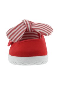 Scarpa rossa per bambini con suola bianca, caratterizzata da un grande fiocco a righe rosse e bianche sulla parte superiore e una fodera interna a righe abbinata.