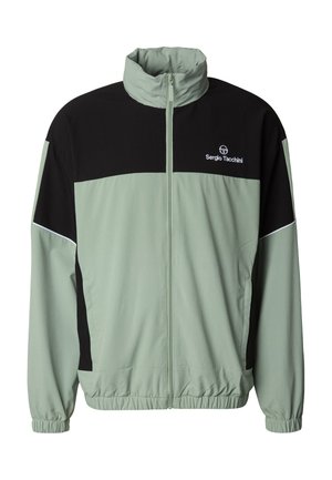 Hellgrüne und schwarze Windjacke mit hohem Kragen, Frontreißverschluss, elastischen Bündchen und Taschen. Verfügt über ein Logo auf der Brust und kontrastierende Farben.