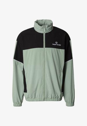 Hellgrüne und schwarze Windjacke mit hohem Kragen, Frontreißverschluss, elastischen Bündchen und Taschen. Verfügt über ein Logo auf der Brust und kontrastierende Farben.