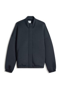 Donkergrijze sweatshirt met een hoge kraag, verlaagde schouders en elastische manchetten. Beschikt over een minimalistisch ontwerp en zijzakken. Glad textuur.