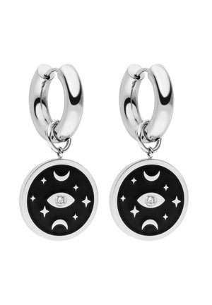 Silver hoop earrings with black circular charms featuring an eye, crescent moons, stars, and a small central crystal.