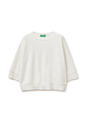 Felpa bianca corta con ampie maniche a tre quarti e scollo, polsini e orlo a costine, con etichetta del marchio verde all'interno del collo.