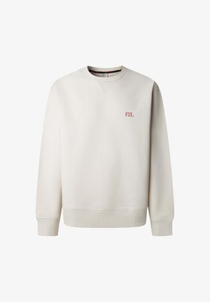 Šviesiai smėlio spalvos džemperis su ilgomis rankovėmis, ribbed apatinių rankovių ir apačios. Kairėje krūtinės pusėje maža raudona "PJL" logotipas. Lygus paviršius.