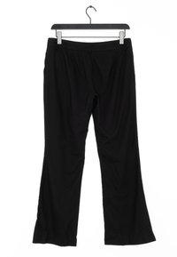 Pantalones de campana negros hechos de tela suave. Presentan una cinturilla elástica y una textura lisa, con un diseño simple y sin patrones visibles.