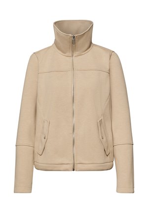 Giacca beige con cerniera, collo alto, maniche lunghe e due tasche frontali con patta e chiusura a bottone.