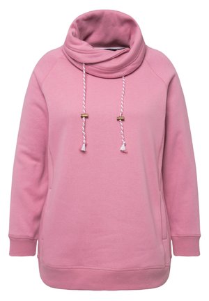 Sudadera con capucha rosa y cuello tipo cowl, que presenta cordones trenzados con acentos dorados y bolsillos laterales. Tejido suave y texturizado.
