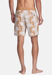 Brown swim trunks with white palm leaf pattern, elastic waist, and two back pockets. Material appears lightweight and suitable for water activities.