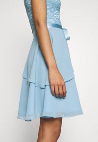 Swing Cocktailklänning - light blue